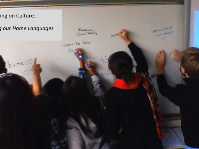 students writing on a whiteboard